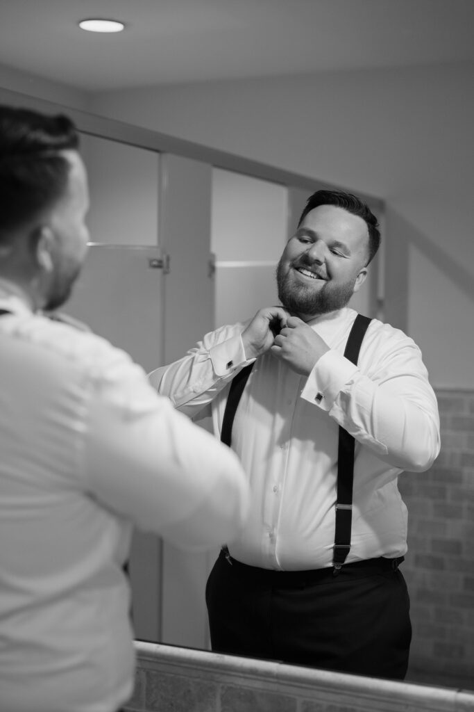 groom getting ready for wedding at The Lambs Fellowship in California