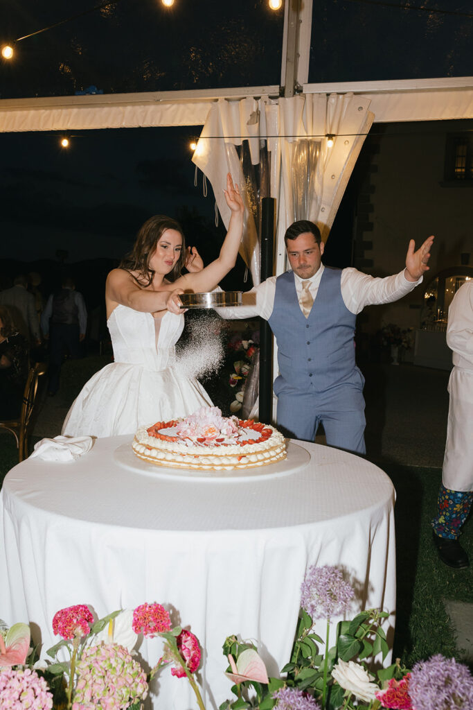bride and groom at their wedding reception t Villa il Palagio